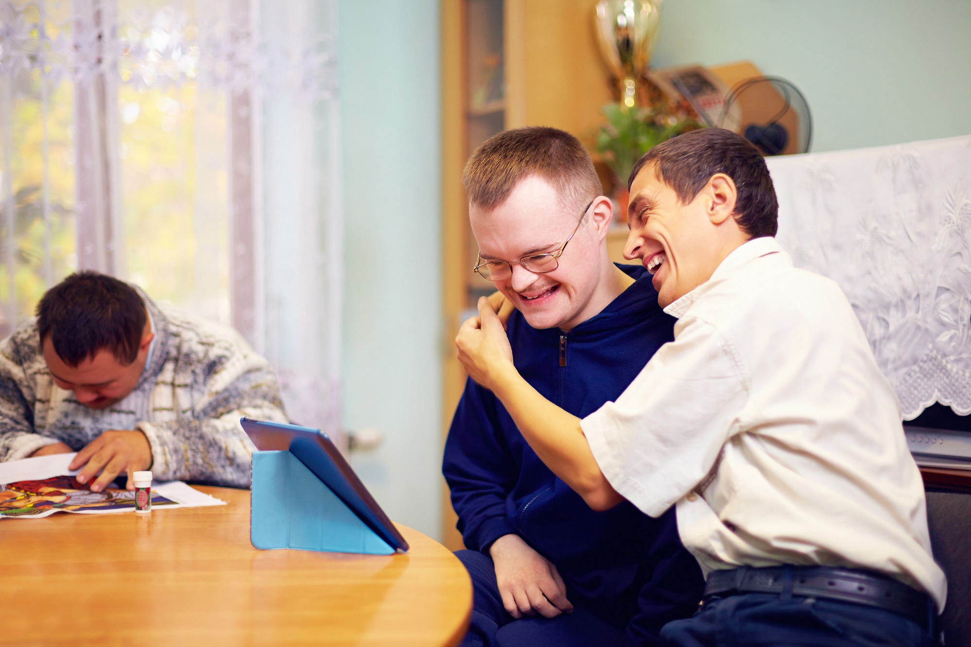 Happy friends with disability socializing